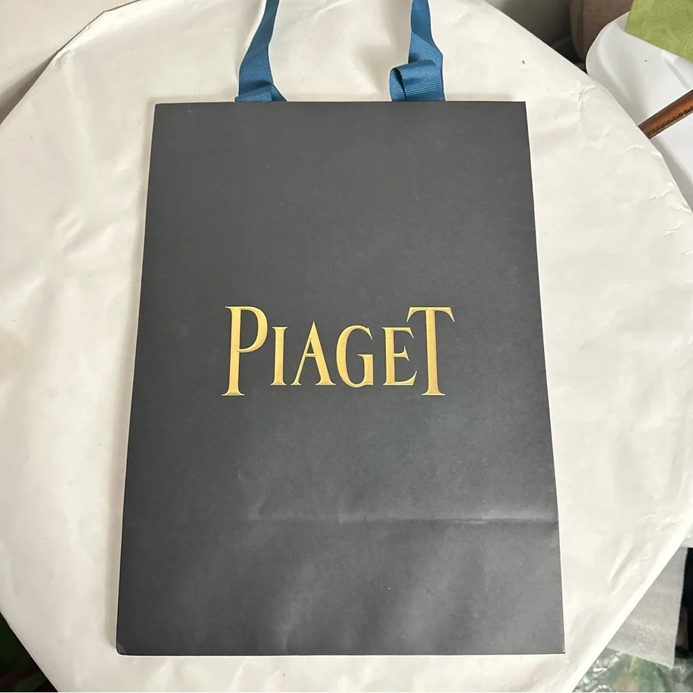 Piaget Luxurious Black and Gold Bag
